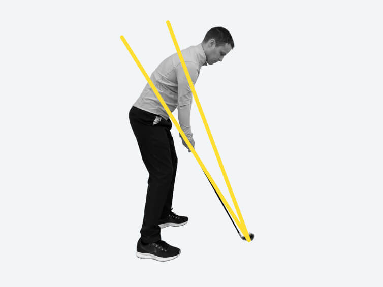 golfer at set up ready for shot